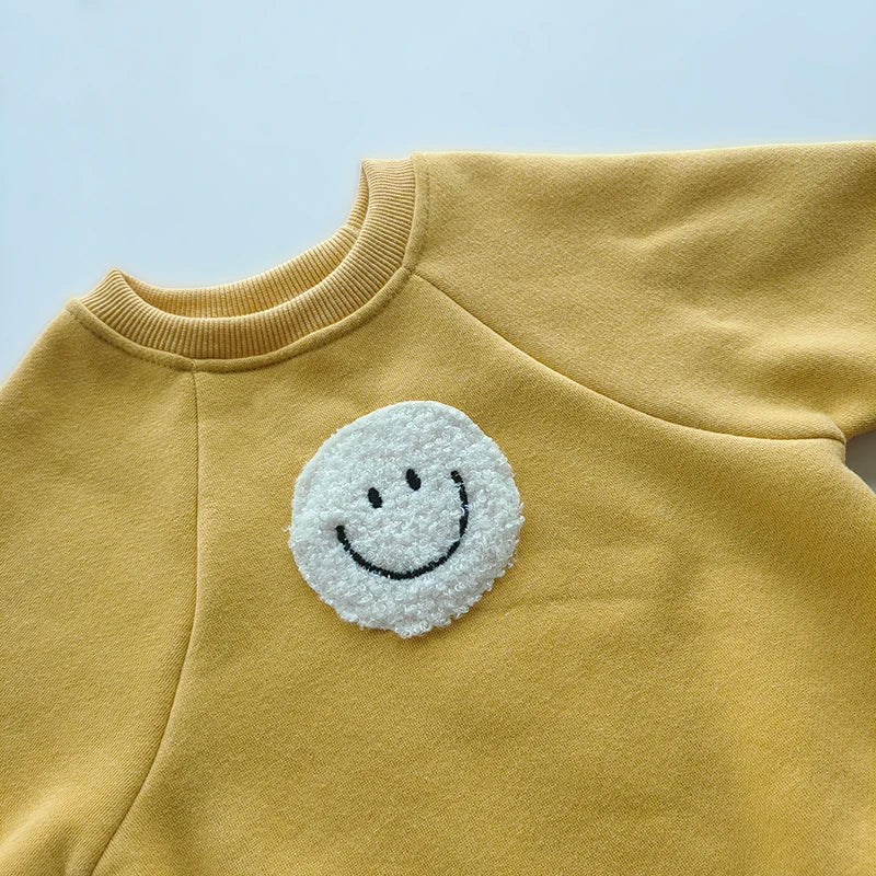 סוודר סמיילי עם תקתקים